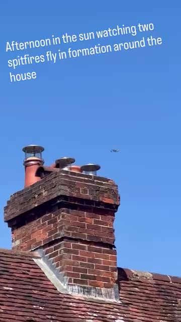 Afternoon in the sun watching two Spitfires fly in formation around the house.